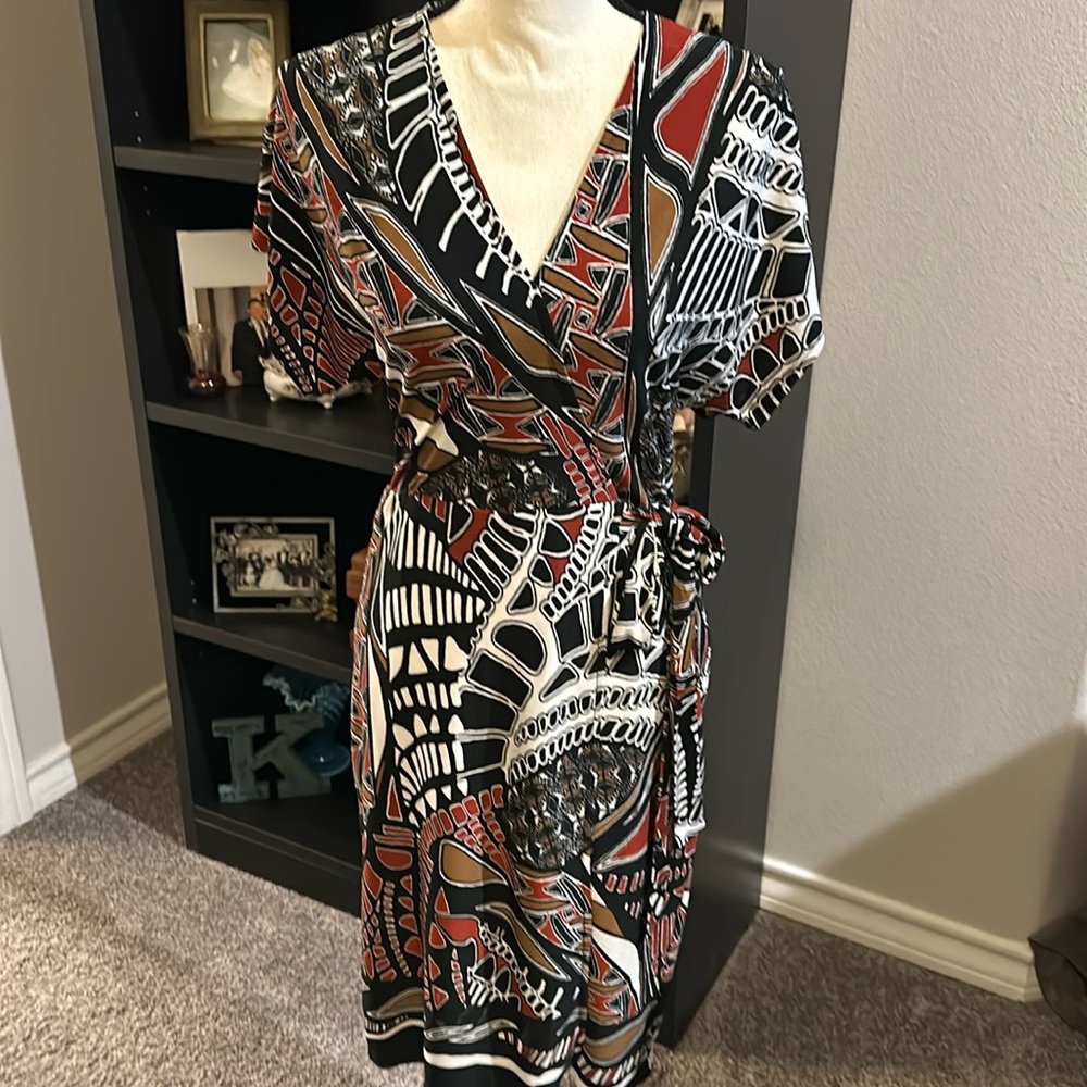 Multi color,stretch material, side tie for show, not a wrap dress